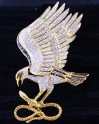 (image for) A 18K YELLOW GOLD DIAMOND SAPPHIRE BROOCH