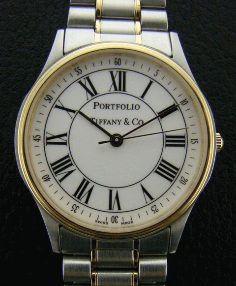 (image for) A TIFFANY STEEL & GOLD WATCH